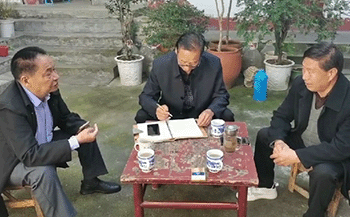 退休老校长李明章 转变“三风”惠乡邻